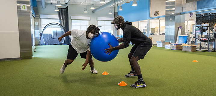 Curtis Avant practicing a football drill