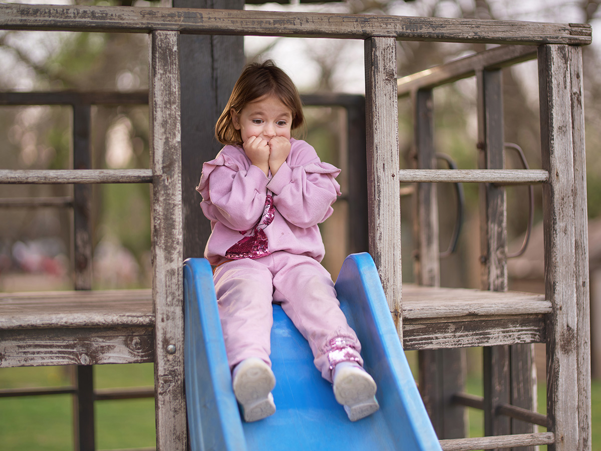 Stressed Child On The Playground