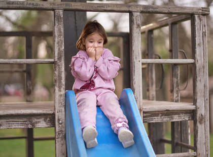 Stressed Child On The Playground