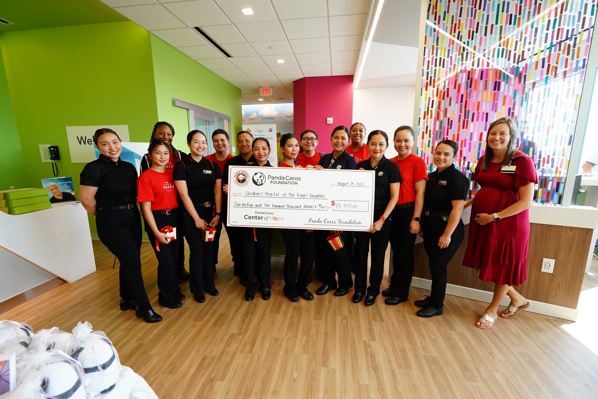 CMNH partner Panda Express presenting a donation check to CHKD.