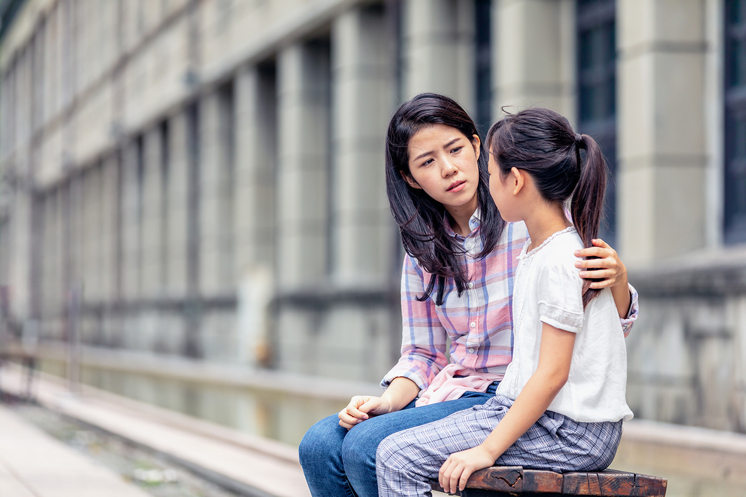 Parent Talking To Child Outside Stock
