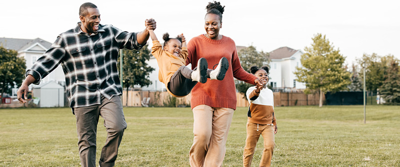 Family enjoying springtime outdoors with kids.