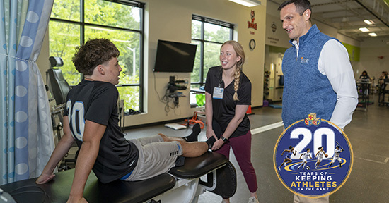 Dr. Micah Lamb with a Patient and Physical Therapist