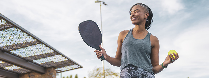 Woman playing pickleball