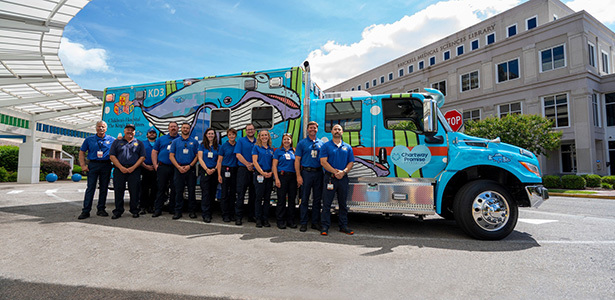 CHKD Transport Team in front of New Ambulance